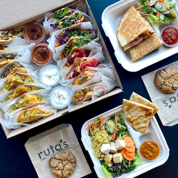 A large box of Indian quesadillas, two individual quesadilla meals, and two Ruta's cookies.